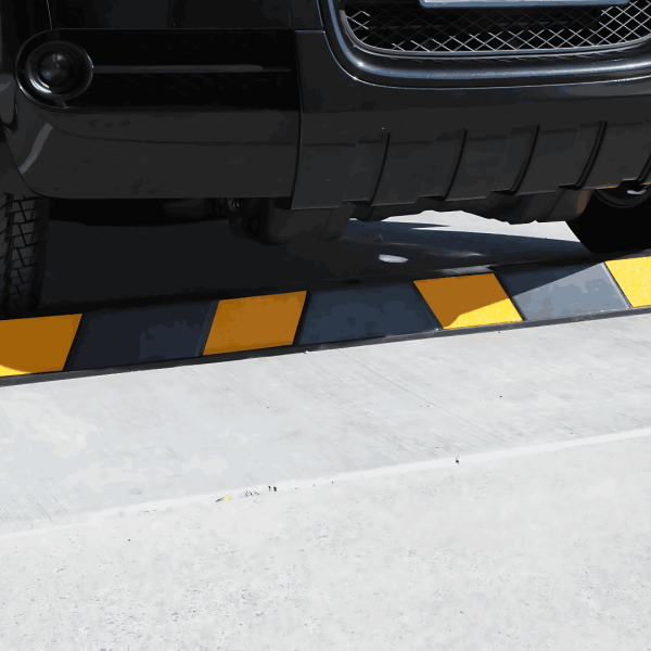 Vehicle positioned against rubber parking stop